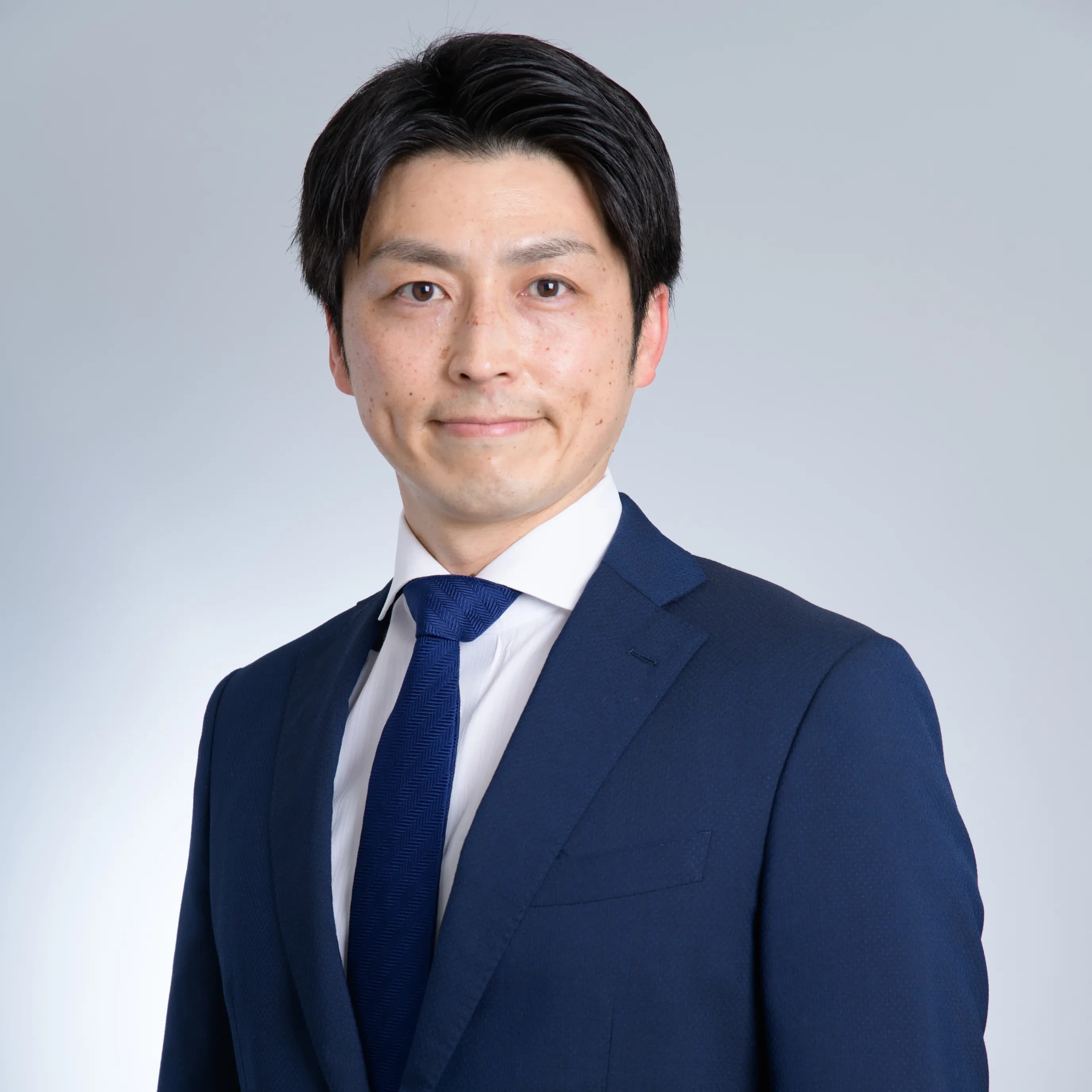 代表 日高 拓郎 写真